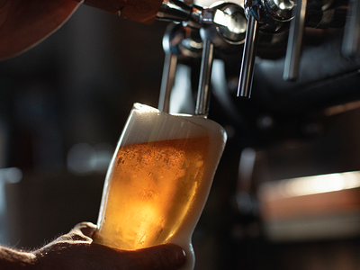 Pouring a pint  - Credit: iStock - 1187011005
